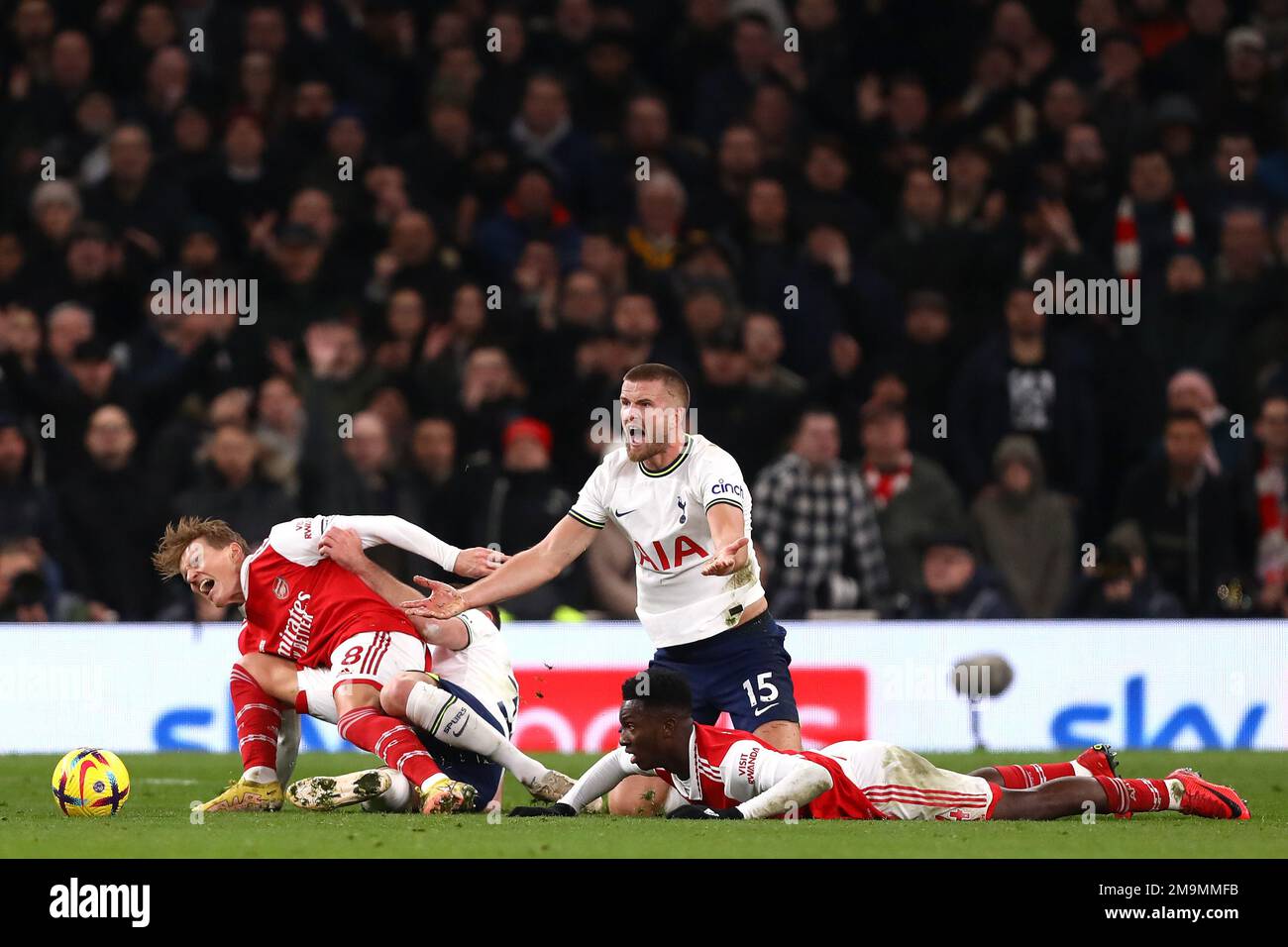 Eric Dier of Tottenham Hotspur remonstrates after a challenge from Eddie Nketiah of Arsenal as Martin Odegaard of Arsenal is tackled by Clement Lenglet of Tottenham Hotspur - Tottenham Hotspur v Arsenal, Premier League, Tottenham Hotspur Stadium, London, UK - 15th January 2023  Editorial Use Only - DataCo restrictions apply Stock Photo