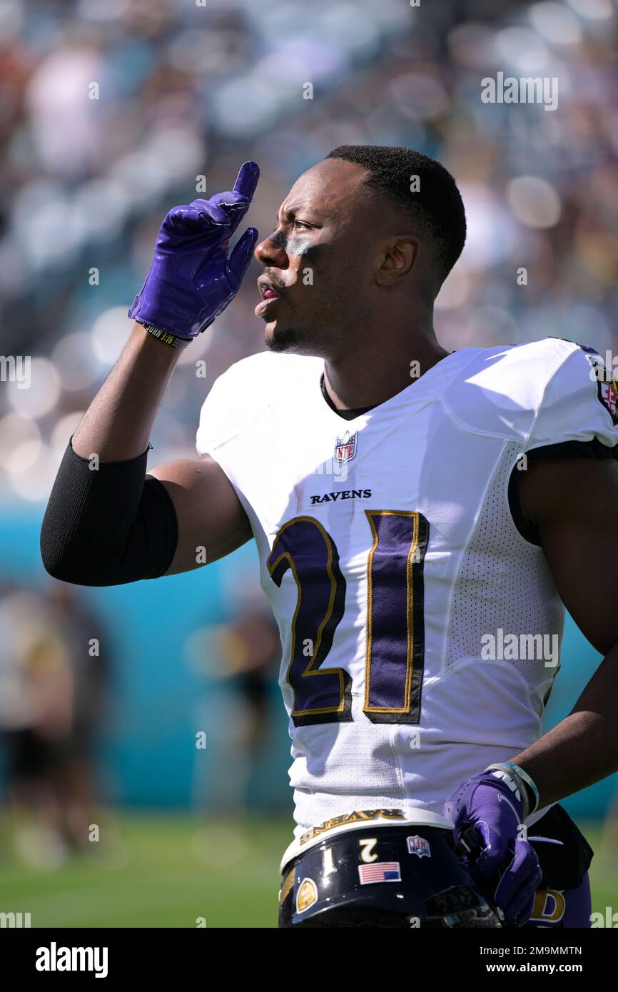 Baltimore Ravens cornerback Brandon Stephens (21) stands on the field  before the start of an NFL