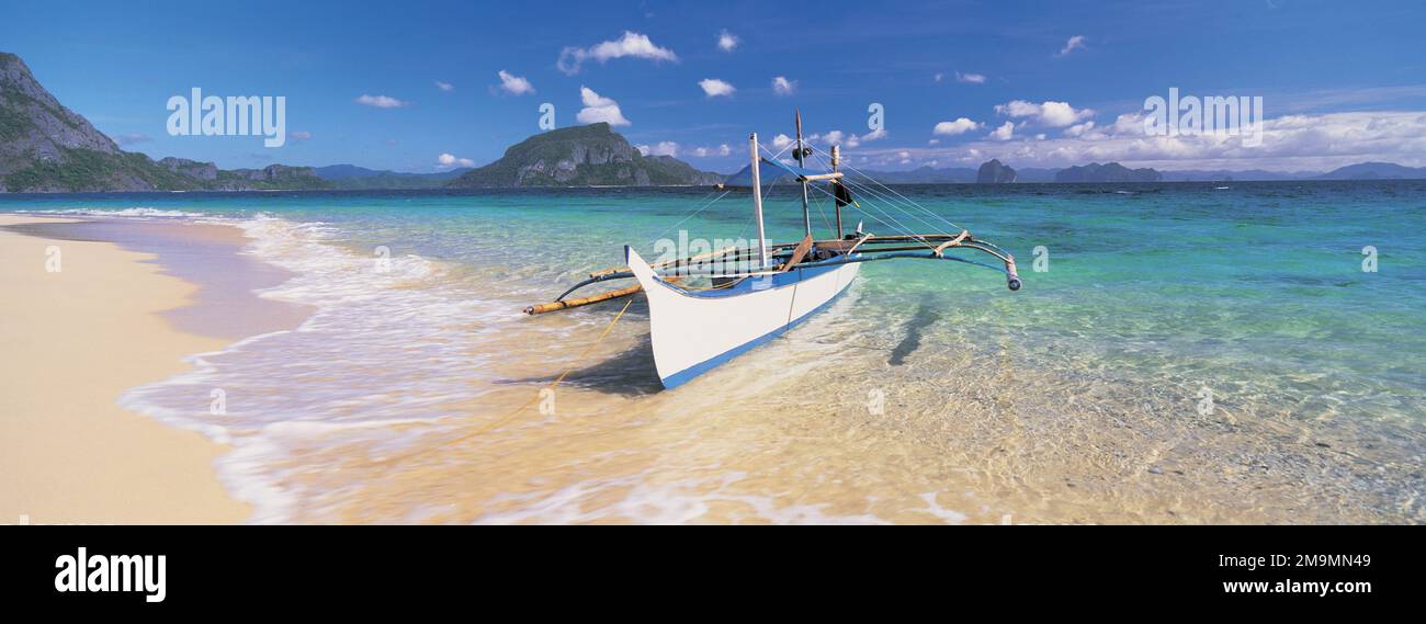 Fishing boat moored on the beach, Palawan, Philippines Stock Photo