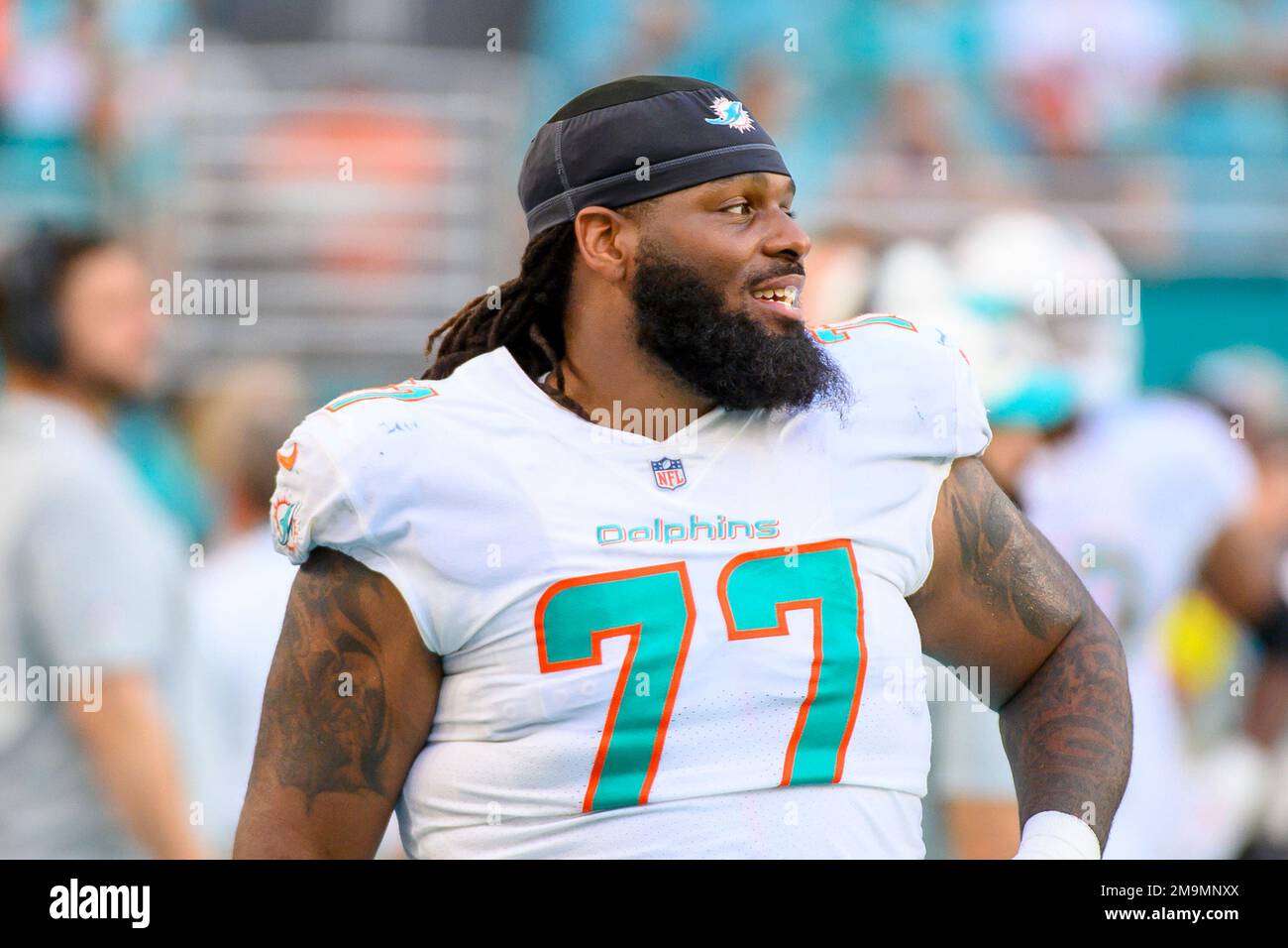 Miami Dolphins defensive tackle John Jenkins (77) celebrates after the  Dolphins defeated the New England Patriots with a score of 20-7 during an  NFL football game Sunday, Sept. 11, 2022, in Miami