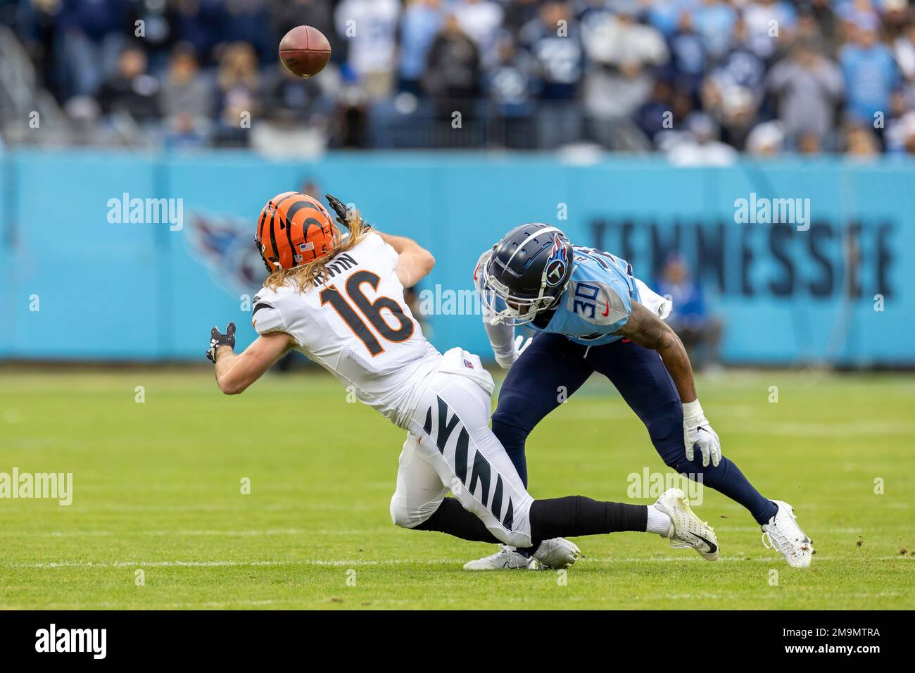 Tennessee Titans cornerback Trey Avery (30) breaks up a pass intended for  Cincinnati Bengals wide receiver Trenton Irwin (16) in an NFL football  game, Sunday, Nov. 27, 2022, in Nashville, Tenn. Bengals