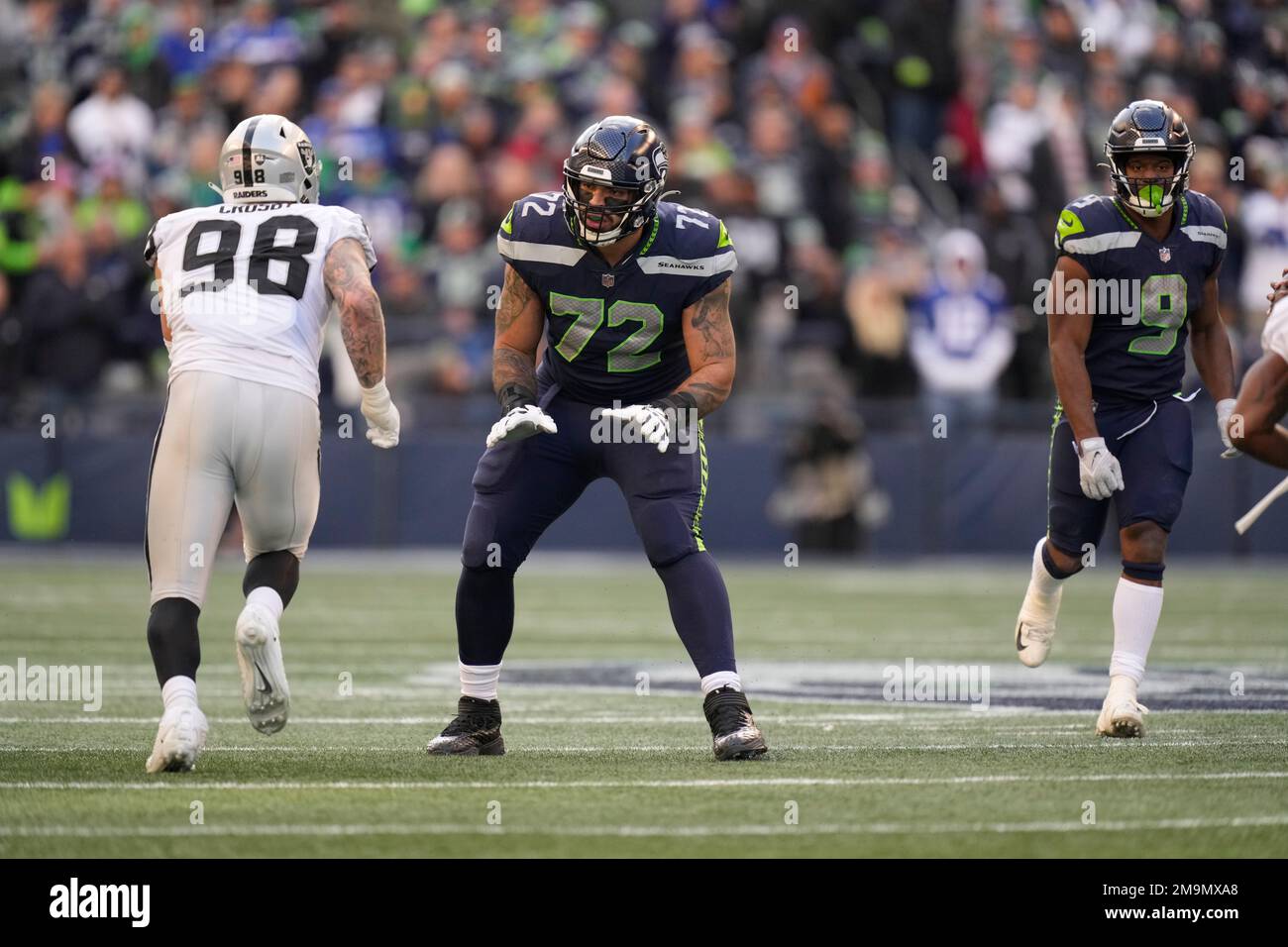 Seattle Seahawks offensive tackle Abraham Lucas (72) gets set during an NFL  football game against the Las Vegas Raiders, Sunday, Nov. 27, 2022, in  Seattle, WA. The Raiders defeated the Seahawks 40-34. (