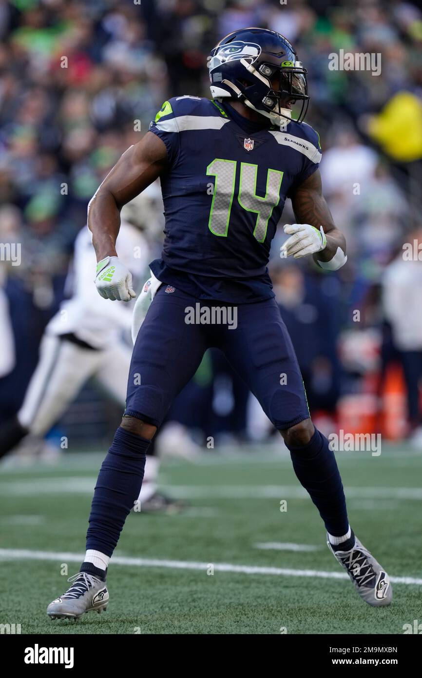 Seattle Seahawks wide receiver DK Metcalf (14) looks back during