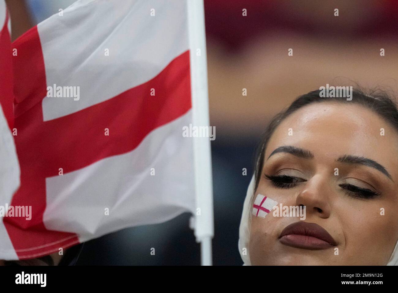 A fan waves an England flag at the stand prior the World Cup group B ...