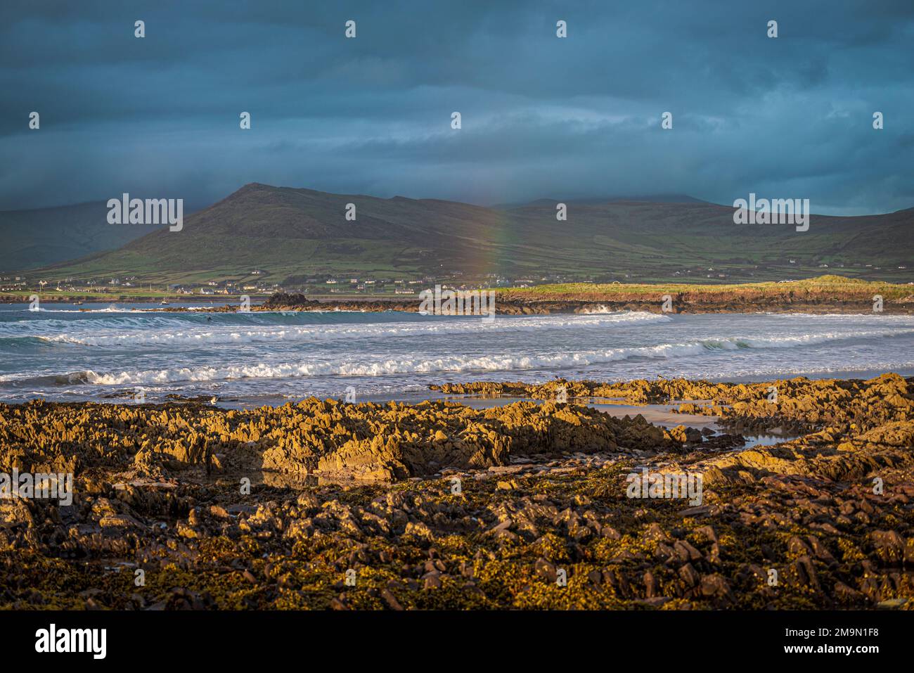 Atlantic Ocean, mountains, beaches, cloudy skies, rainbows, Dingle Peninsula on Ireland’s Wild Atlantic Way, southwest Atlantic coast Stock Photo
