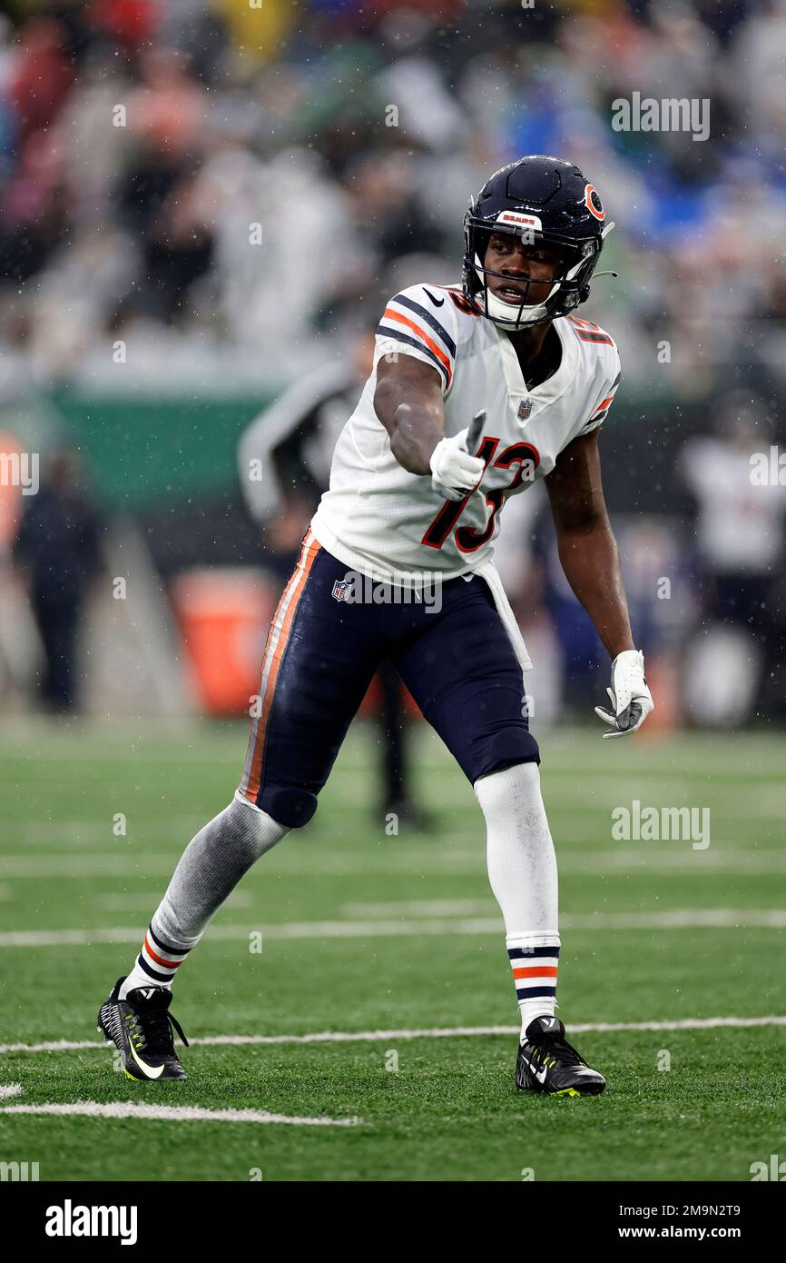 Chicago Bears wide receiver Byron Pringle (13) pulls the ball away from New  York Jets cornerback D.J. Reed (4) for a touchdown catch during the first  quarter of an NFL football game