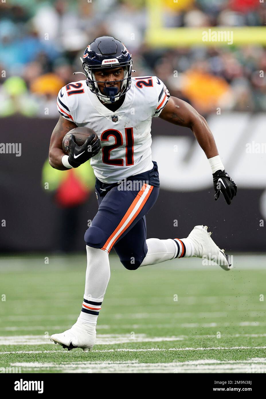 Chicago Bears running back Darrynton Evans (21) carries the ball