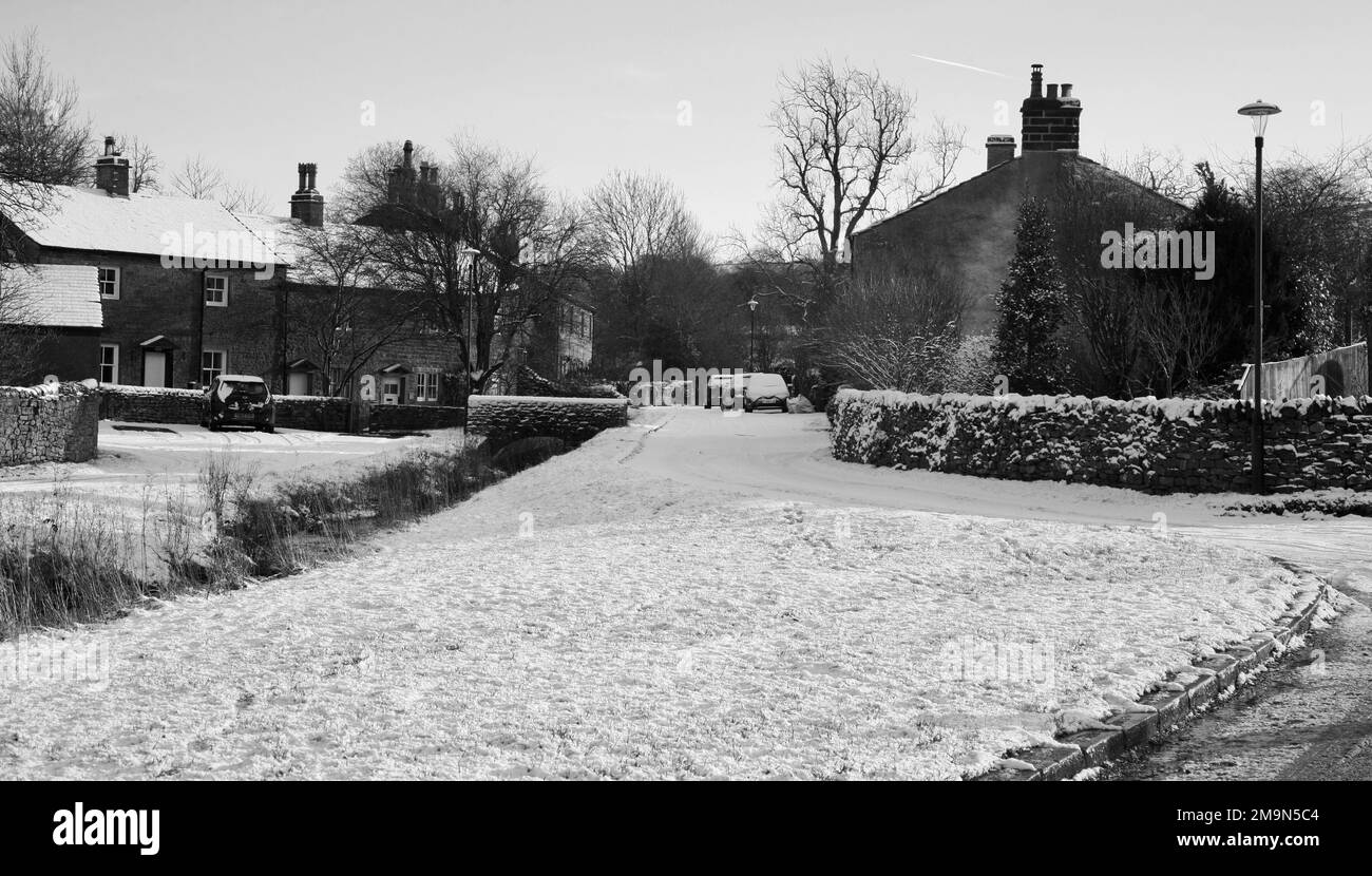A snowy scene in the village of Downham near Clitheroe, Lancashire, United Kingdom, Europe Stock Photo