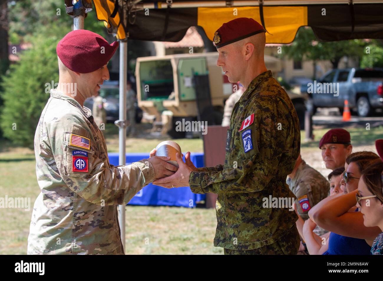 Brig. Gen. Robert T. Ritchie, assistant commanding general - operations, XVIII Airborne Corps, receives a shell casing on Ft. Bragg, N.C. May 20, 2022. The shell casing comes from a 15- round salute by Paratroopers assigned to B-Co, 3rd Battalion, 319th Field Artillery Regiment, commanded by Capt. Michael Polland and 1st. Sgt. Jose Lopez. Stock Photo