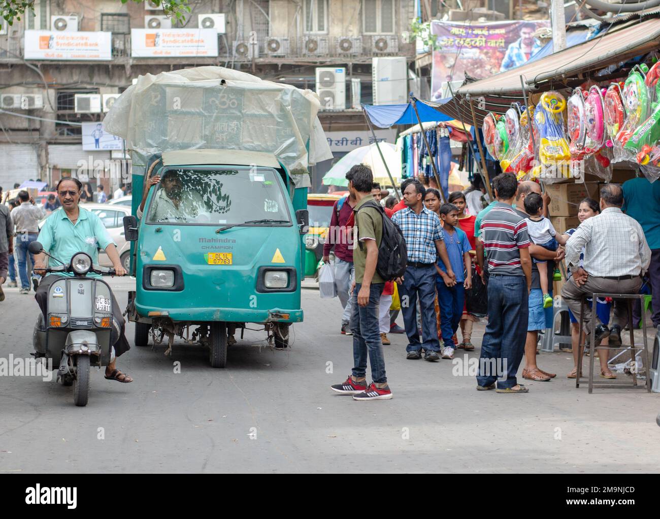 Indian people walking at the bazaar outdoor. Street market downtown Stock Photo