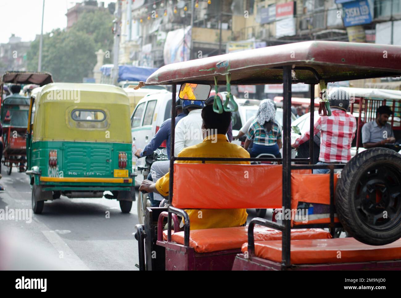 Traffic jam with tuk tuk taxi in the street. New delhi India. Traditional transportation Stock Photo