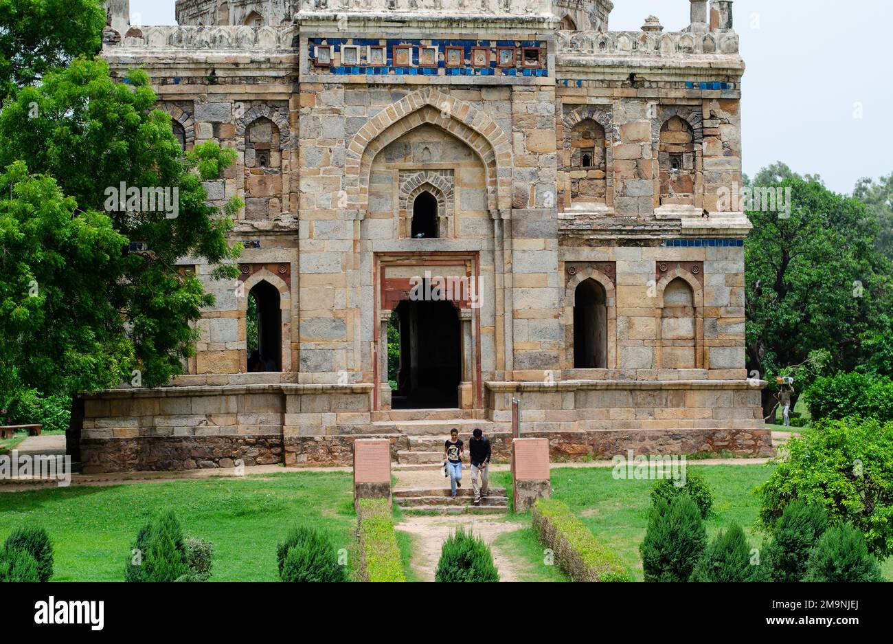The bara gumbad and masjid mosque monument in lodhi gardens new delhi india. Stock Photo