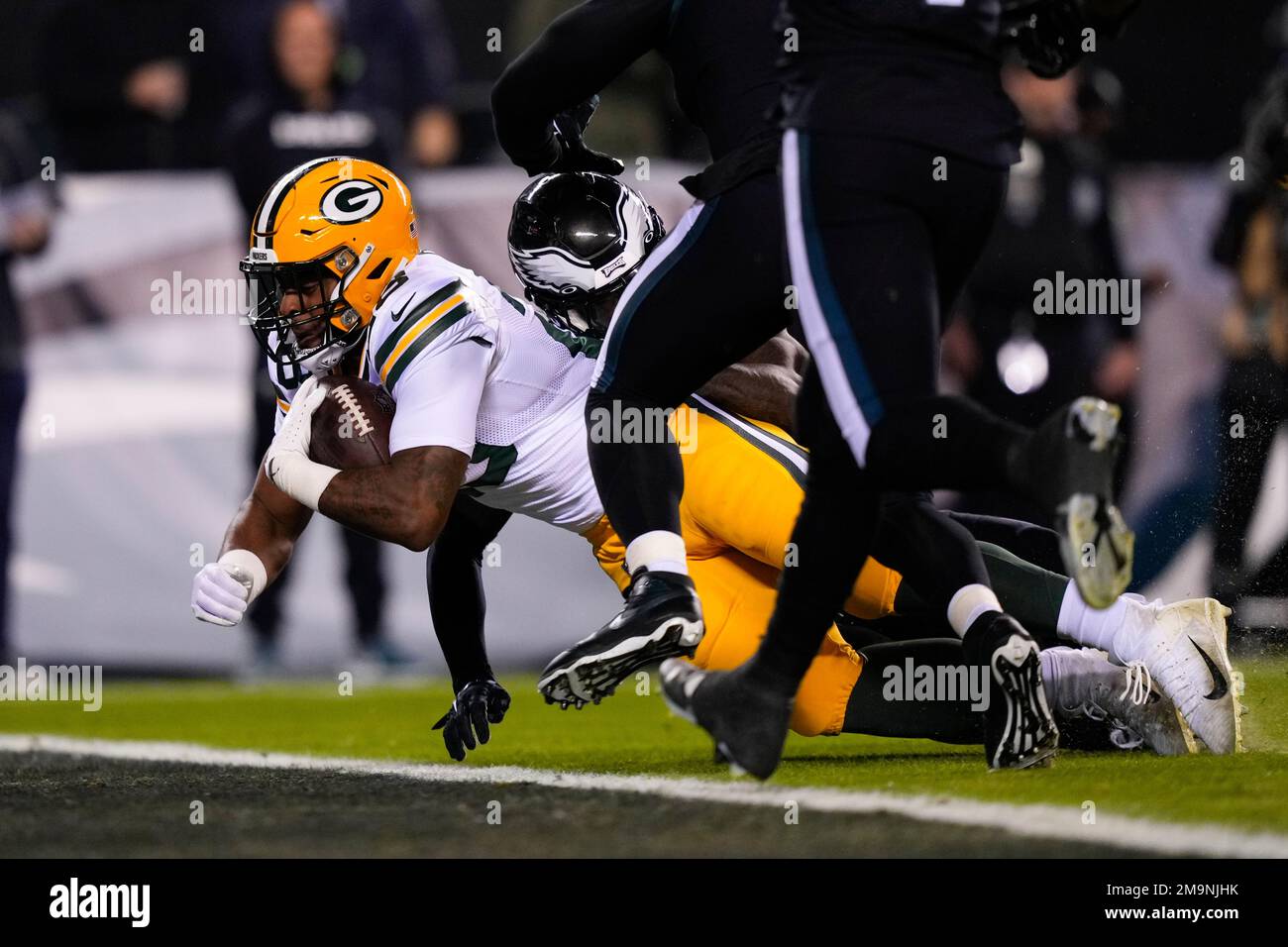 Green Bay Packers' AJ Dillon reacts after running for a touchdown during  the first half of an NFL football game against the Philadelphia Eagles,  Sunday, Nov. 27, 2022, in Philadelphia. (AP Photo/Matt