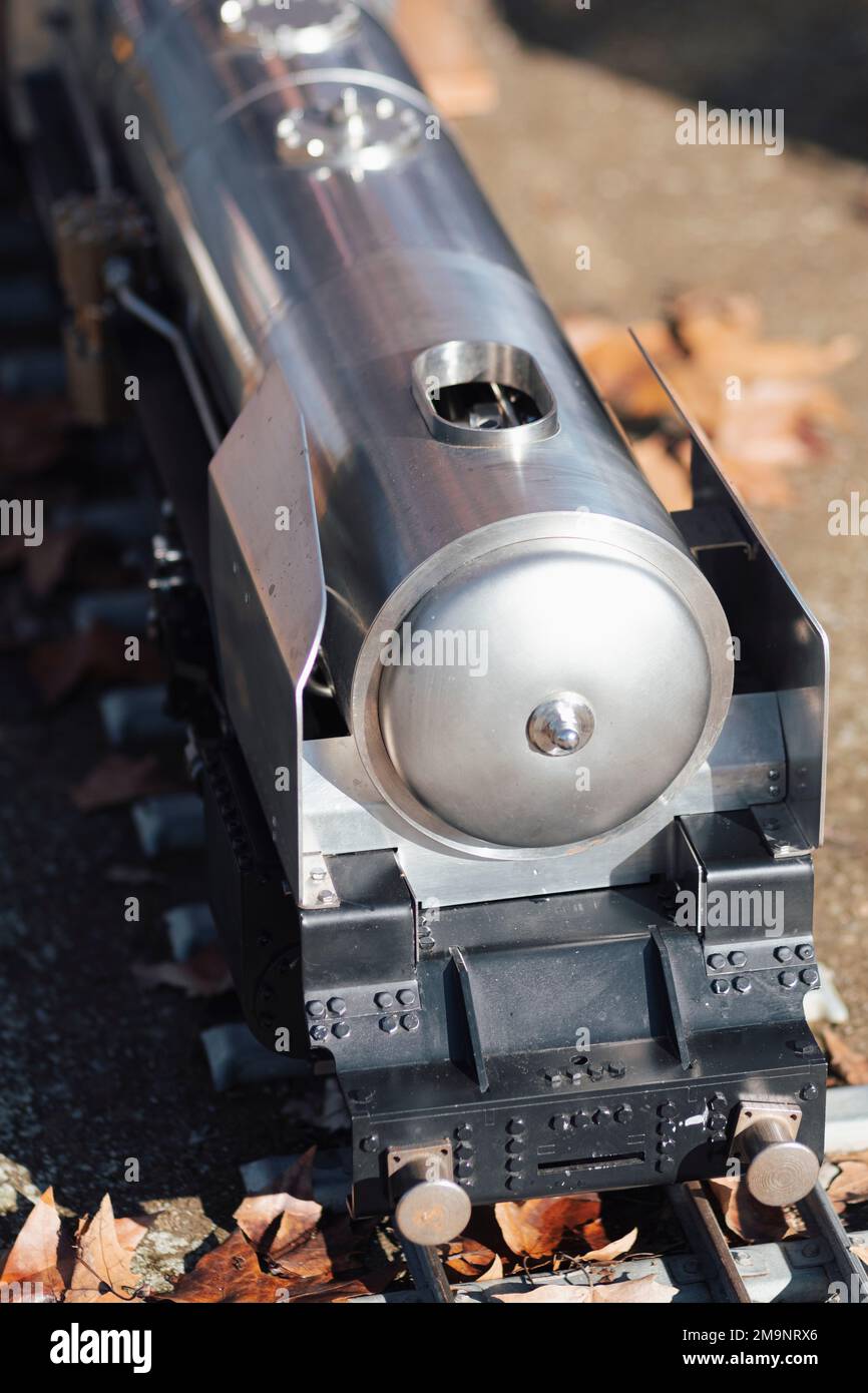 Iron steam train close up still on a railway from high up point of view Stock Photo