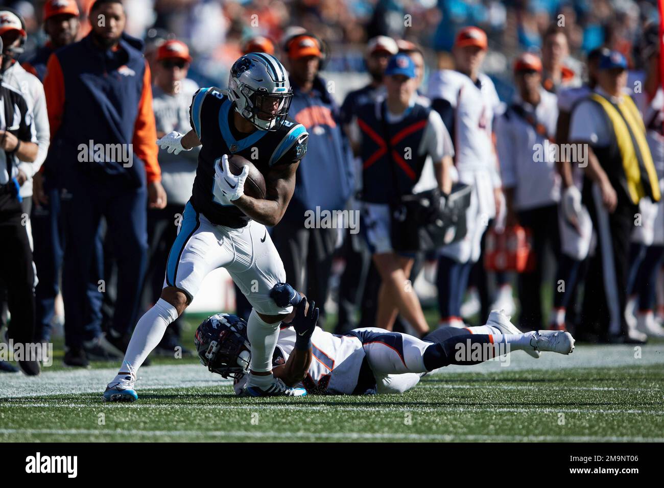 Denver Broncos cornerback Damarri Mathis (27) tries to tackle Carolina