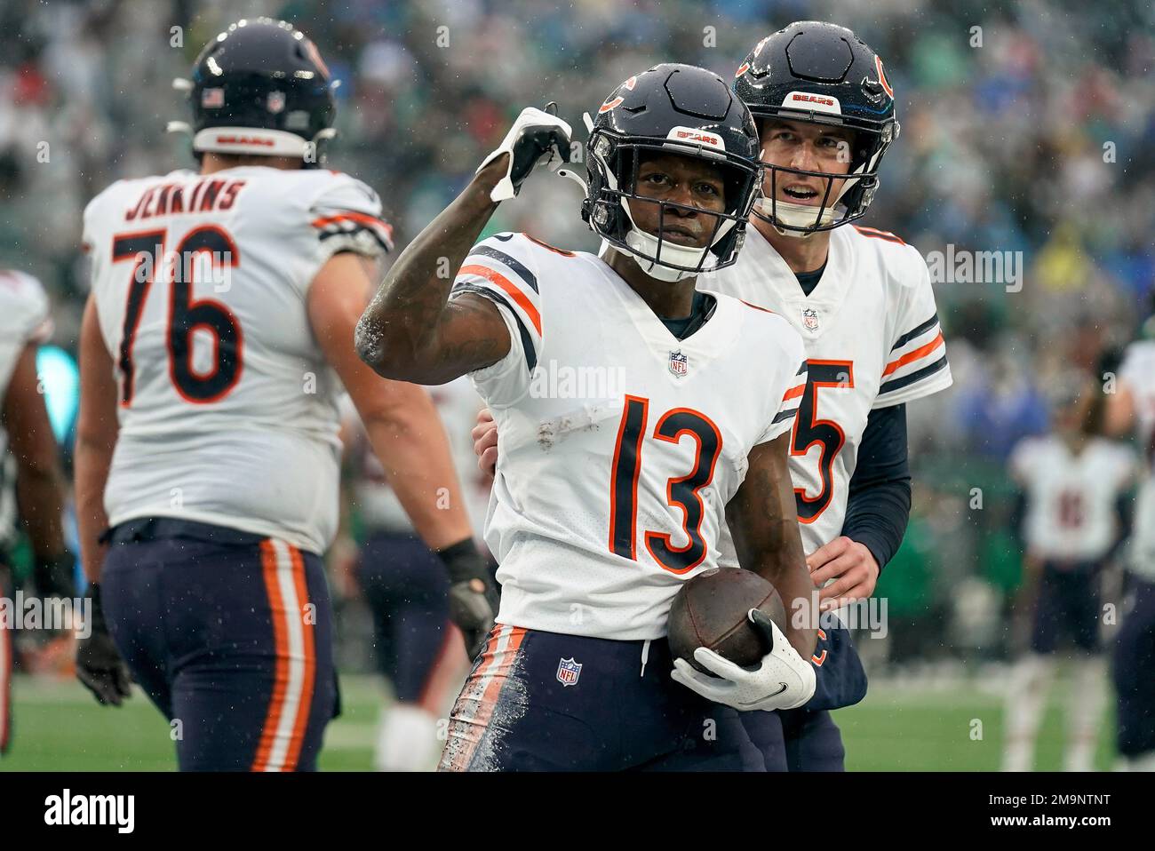 Chicago Bears wide receiver Byron Pringle (13) pulls the ball away from New  York Jets cornerback D.J. Reed (4) for a touchdown catch during the first  quarter of an NFL football game