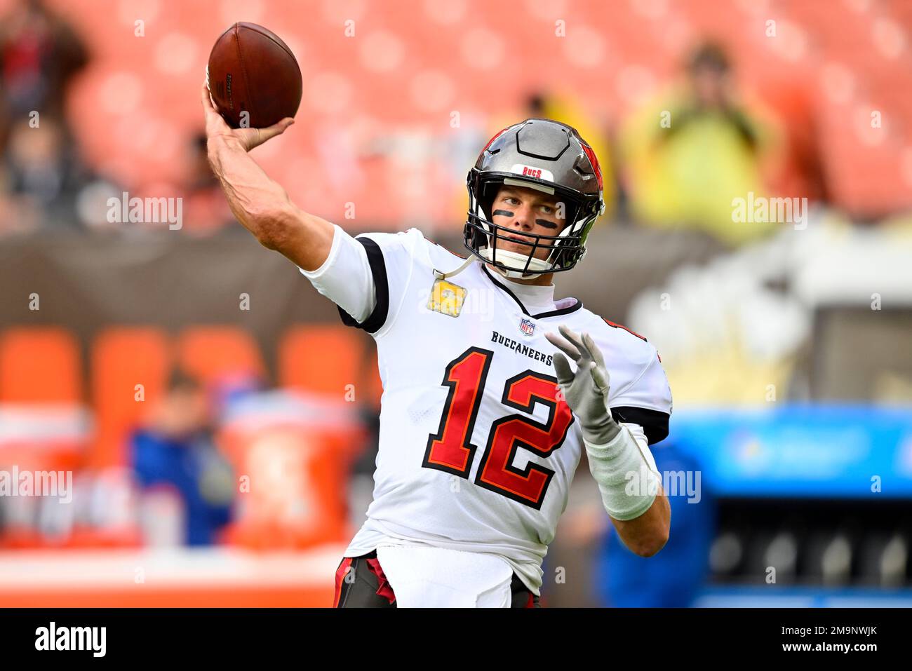 Tampa Bay Buccaneers quarterback Tom Brady (12) warms up prior to the start  of an NFL football game against the Cleveland Browns, Sunday, Nov. 27,  2022, in Cleveland. (AP Photo/Kirk Irwin Stock