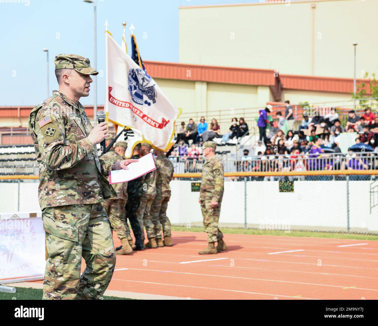 U.S. Army Col. Seth C. Graves, USAG Humphreys commander, gives a speech during the Humphreys Unified Special Olympics Track & Field Event May 20, 2022. The event was held at Humphreys Middle School Track and included participants from Humphreys Central Elementary, Humphreys West Elementary, Humphreys Middle School and Humphreys High School. Stock Photo