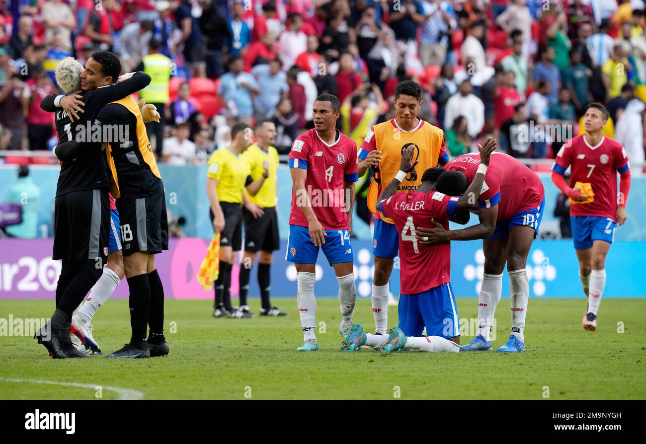 Costa Rica's players celebrate after winning the World Cup, group E