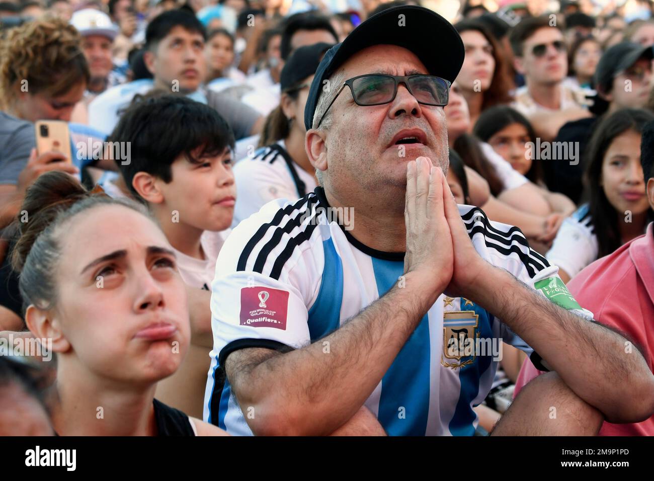 Argentine soccer fans watch their team's match against Mexico at the