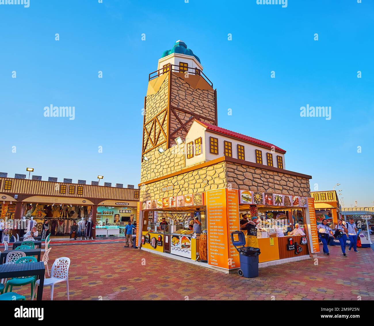 DUBAI, UAE - MARCH 6, 2020: Pavilion of Turkey in Global Village Dubai with food kiosks in Istanbul's Maiden Tower replica, located amid the small squ Stock Photo