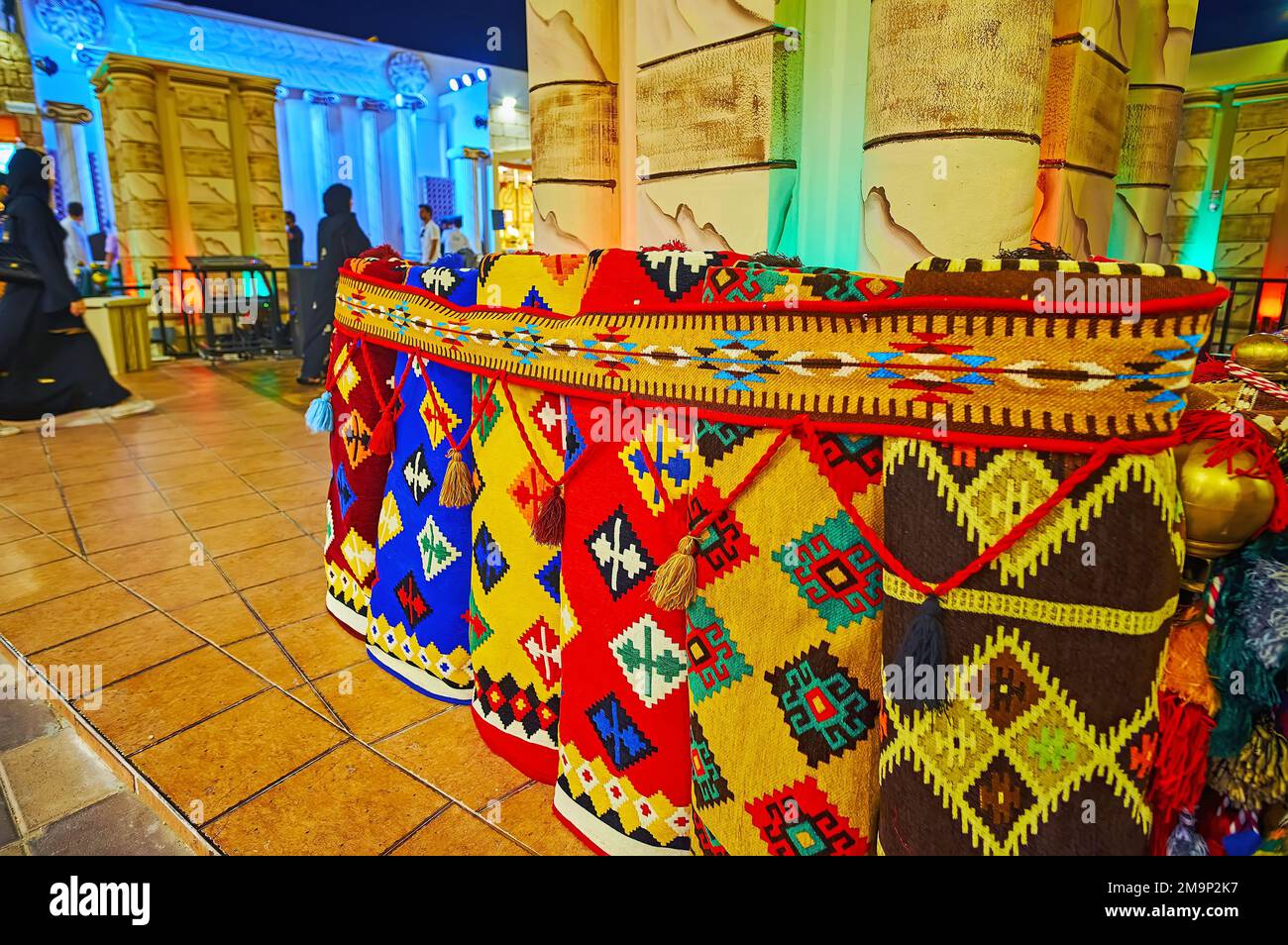 DUBAI, UAE MARCH 6, 2020 The colored rolled up rugs with tribal