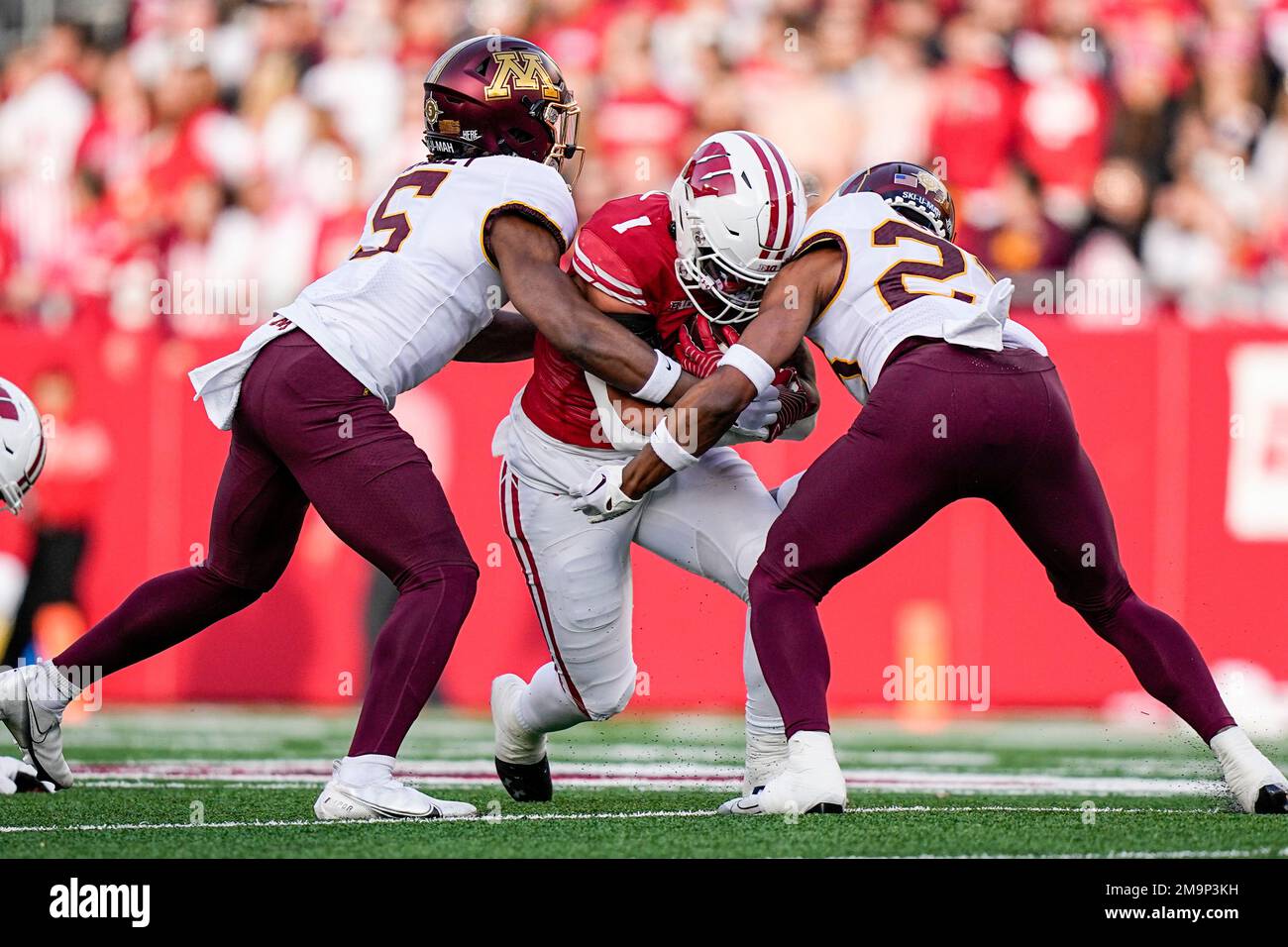 Minnesota defensive back Justin Walley (5) and defensive back Jordan