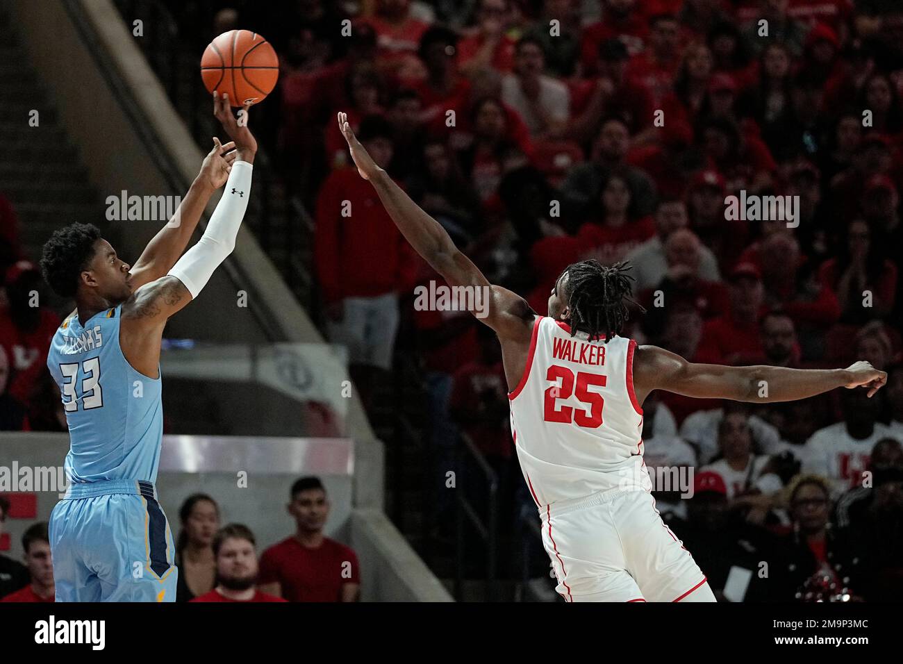 Kent State forward Miryne Thomas (33) shoots over Houston forward