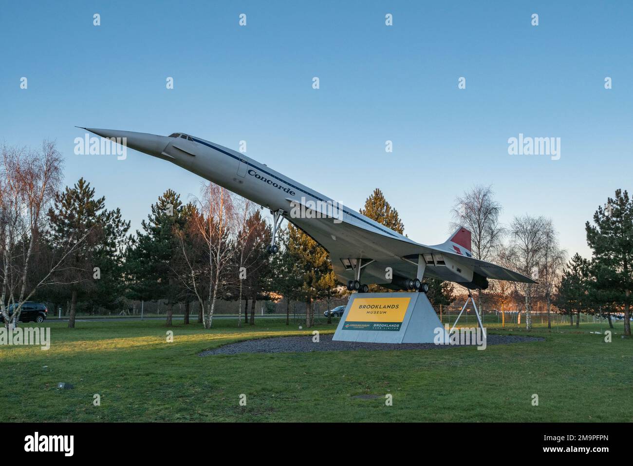 Model of BAC Aerospatiale Concorde at the road entrance to the site including Brooklands Muxseum, the London Bus Museum and  Mercedes-Benz Brooklands. Stock Photo