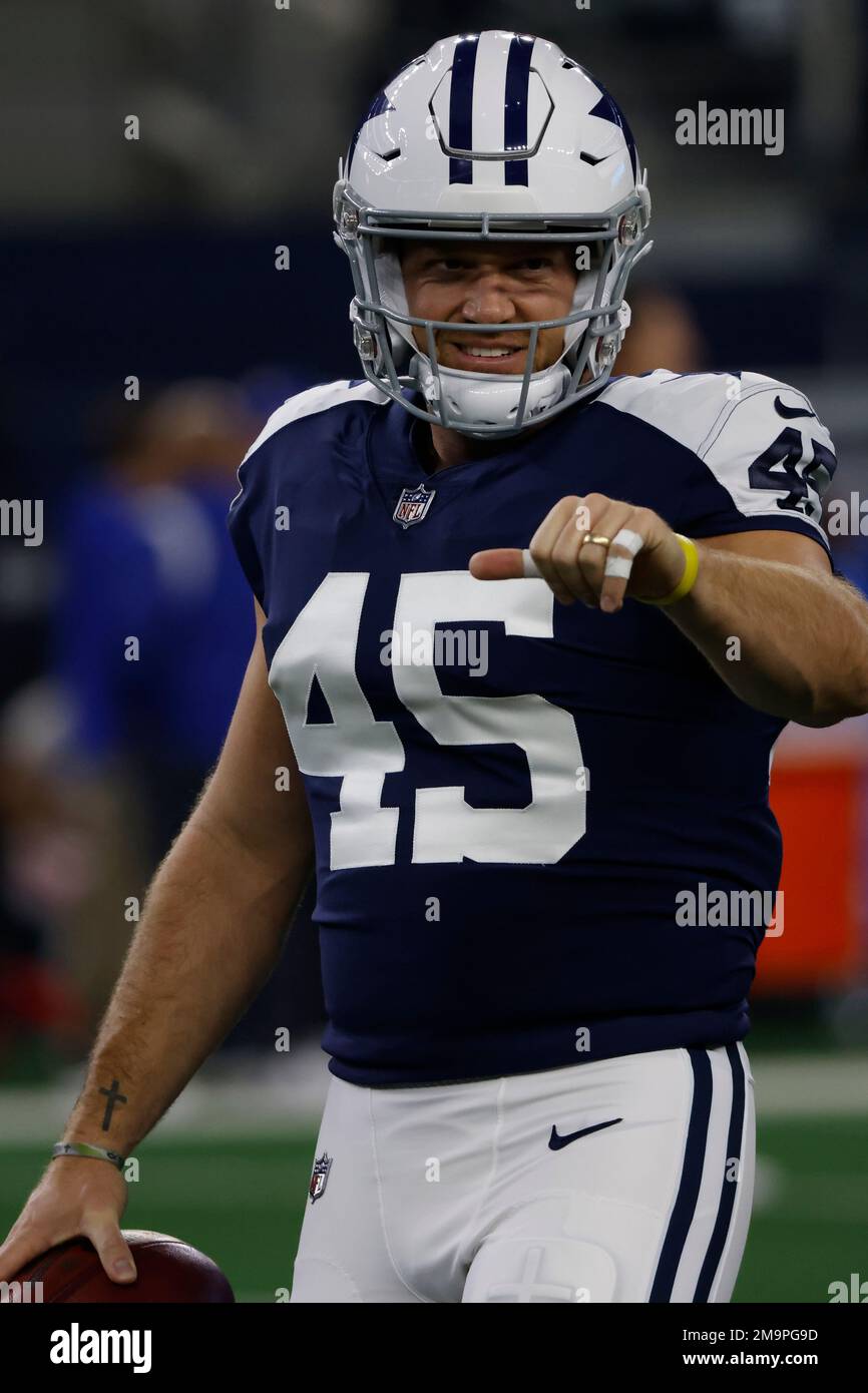Dallas Cowboys long snapper Matt Overton (45) warms up before an NFL