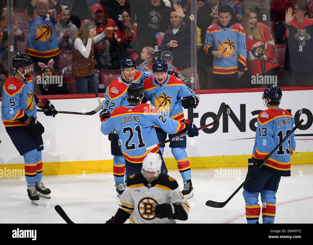Florida Panthers' players celebrate a goal against the Boston Bruins