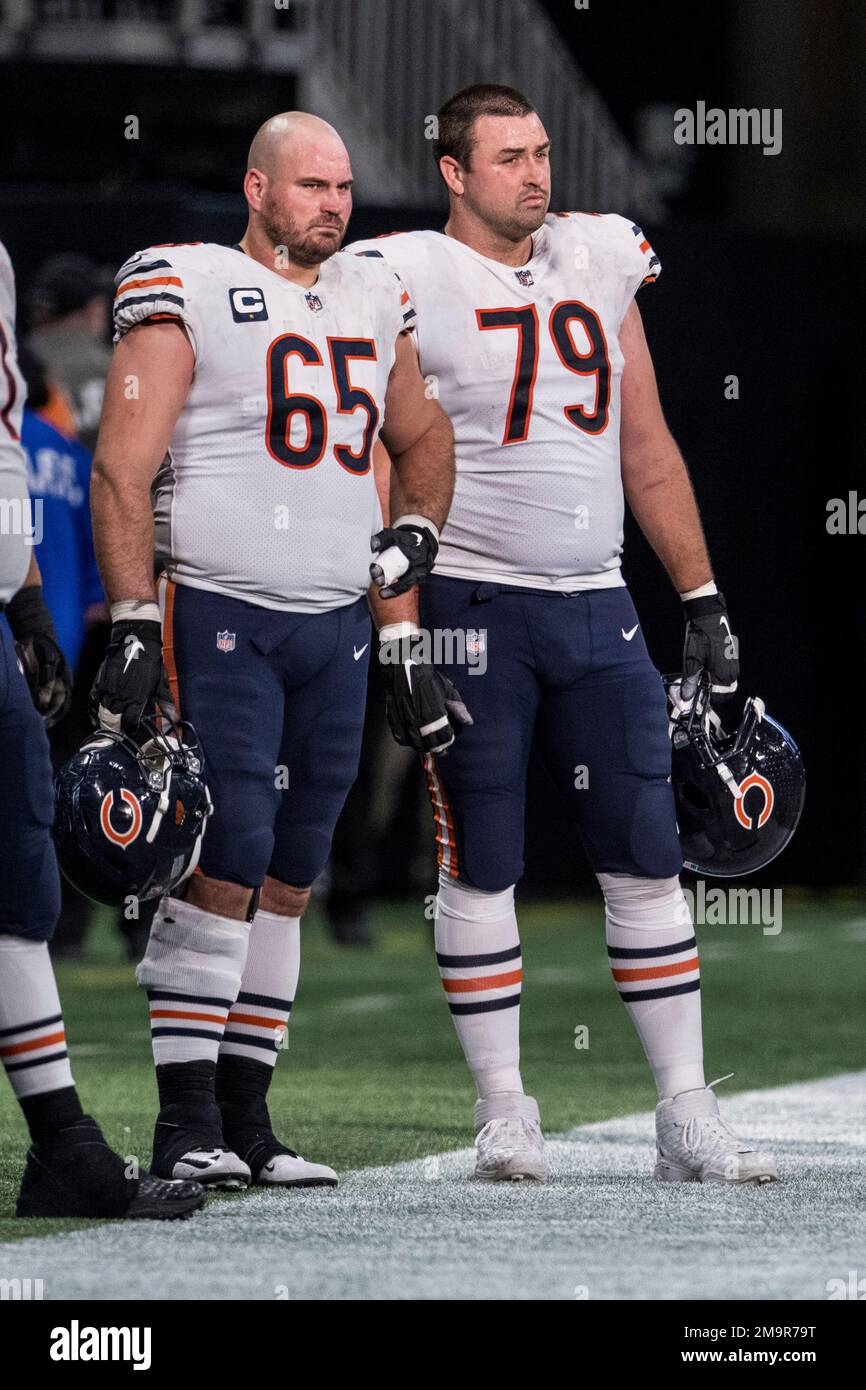 Chicago Bears center Cody Whitehair (65) and guard Michael Schofield III  (79) stand on the sideline during the second half of an NFL football game  against the Atlanta Falcons, Sunday, Nov. 20,