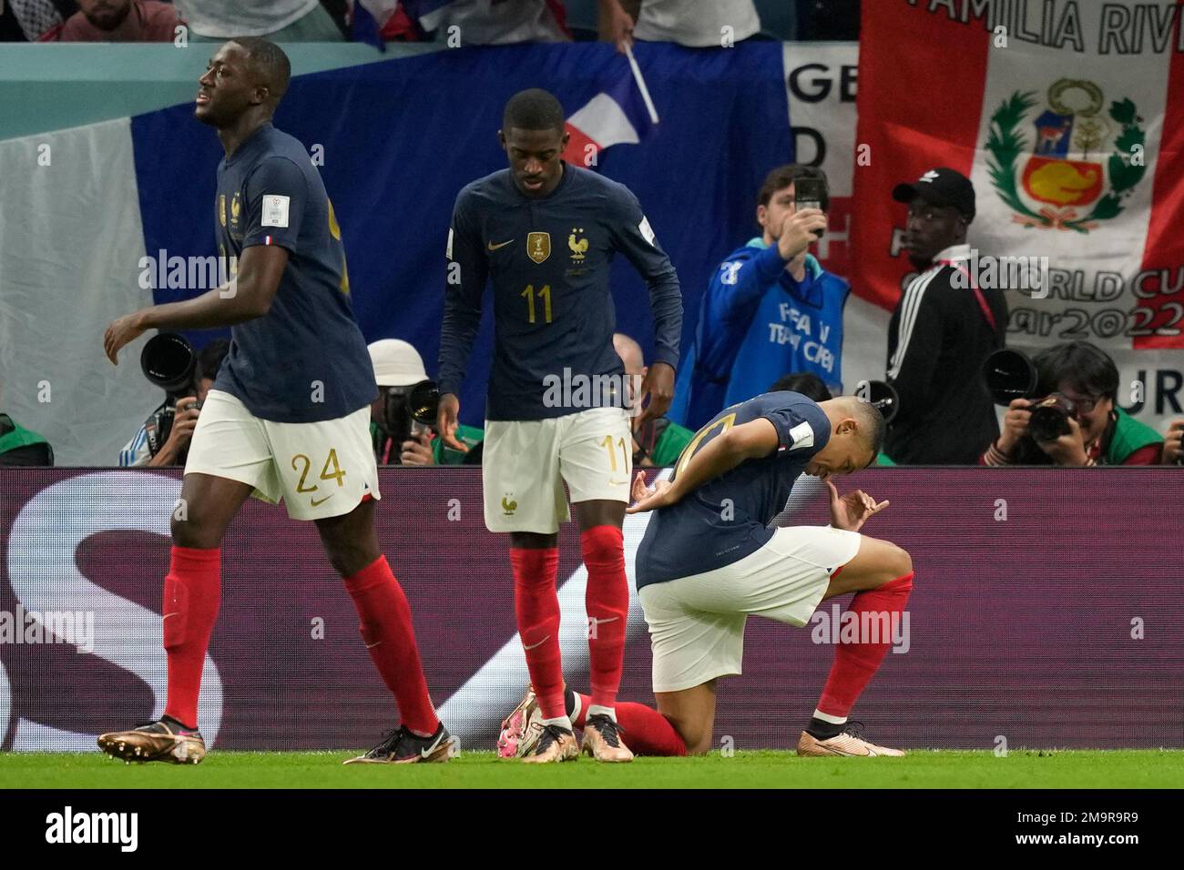 france-s-kylian-mbappe-kneels-after-he-scored-during-the-world-cup