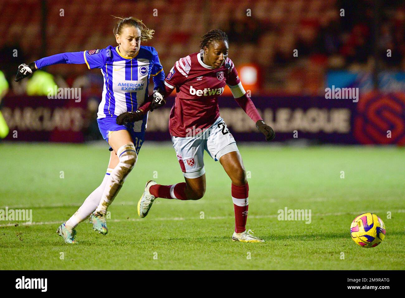 Crawley, UK. 18th Jan, 2023. Kayleigh Green of Brighton and Hove Albion and Hawa Cissoko of West Ham United during the FA Women's League Cup Group C match between Brighton & Hove Albion Women and West Ham United Ladies at The People's Pension Stadium on January 18th 2023 in Crawley, United Kingdom. (Photo by Jeff Mood/phcimages.com) Credit: PHC Images/Alamy Live News Stock Photo