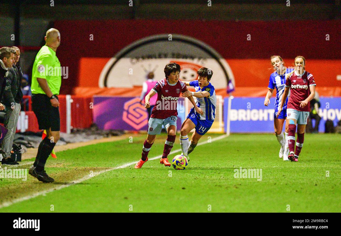 Crawley, UK. 18th Jan, 2023. Honoka Hayashi of West Ham United and Park Ye-Eun of Brighton and Hove Albion during the FA Women's League Cup Group C match between Brighton & Hove Albion Women and West Ham United Ladies at The People's Pension Stadium on January 18th 2023 in Crawley, United Kingdom. (Photo by Jeff Mood/phcimages.com) Credit: PHC Images/Alamy Live News Stock Photo