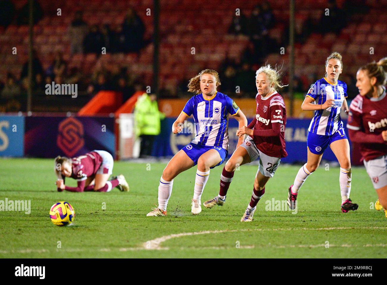 Crawley, UK. 18th Jan, 2023. Libby Bance of Brighton and Hove Albion and Grace Fisk of West Ham United during the FA Women's League Cup Group C match between Brighton & Hove Albion Women and West Ham United Ladies at The People's Pension Stadium on January 18th 2023 in Crawley, United Kingdom. (Photo by Jeff Mood/phcimages.com) Credit: PHC Images/Alamy Live News Stock Photo