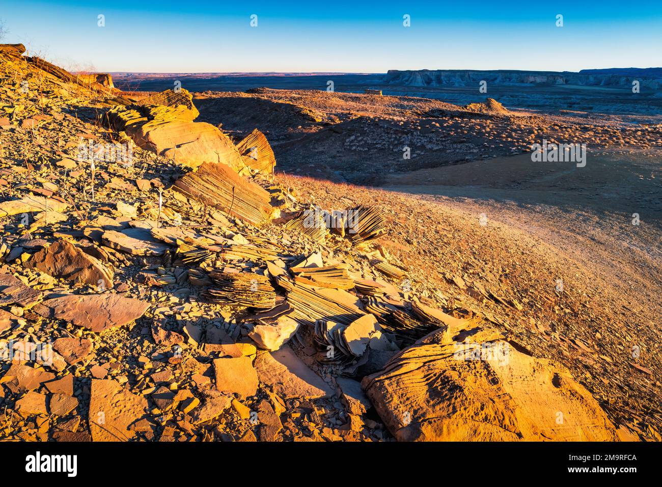Eroded, layered rocks in Glen Canyon Recreation Area near Page, Arizona, and Big Water Utah, USA Stock Photo