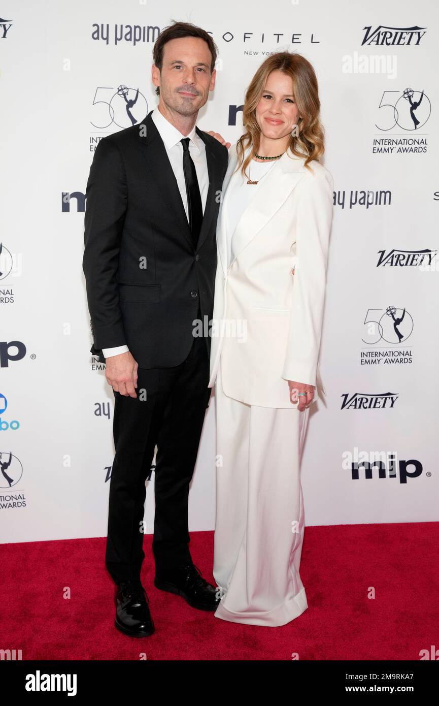Scoot McNairy, left, and Sosie Bacon attend the 50th International Emmy  Awards at the New York Hilton Midtown on Monday. Nov. 21, 2022, in New  York. (Photo by Charles Sykes/Invision/AP Stock Photo -