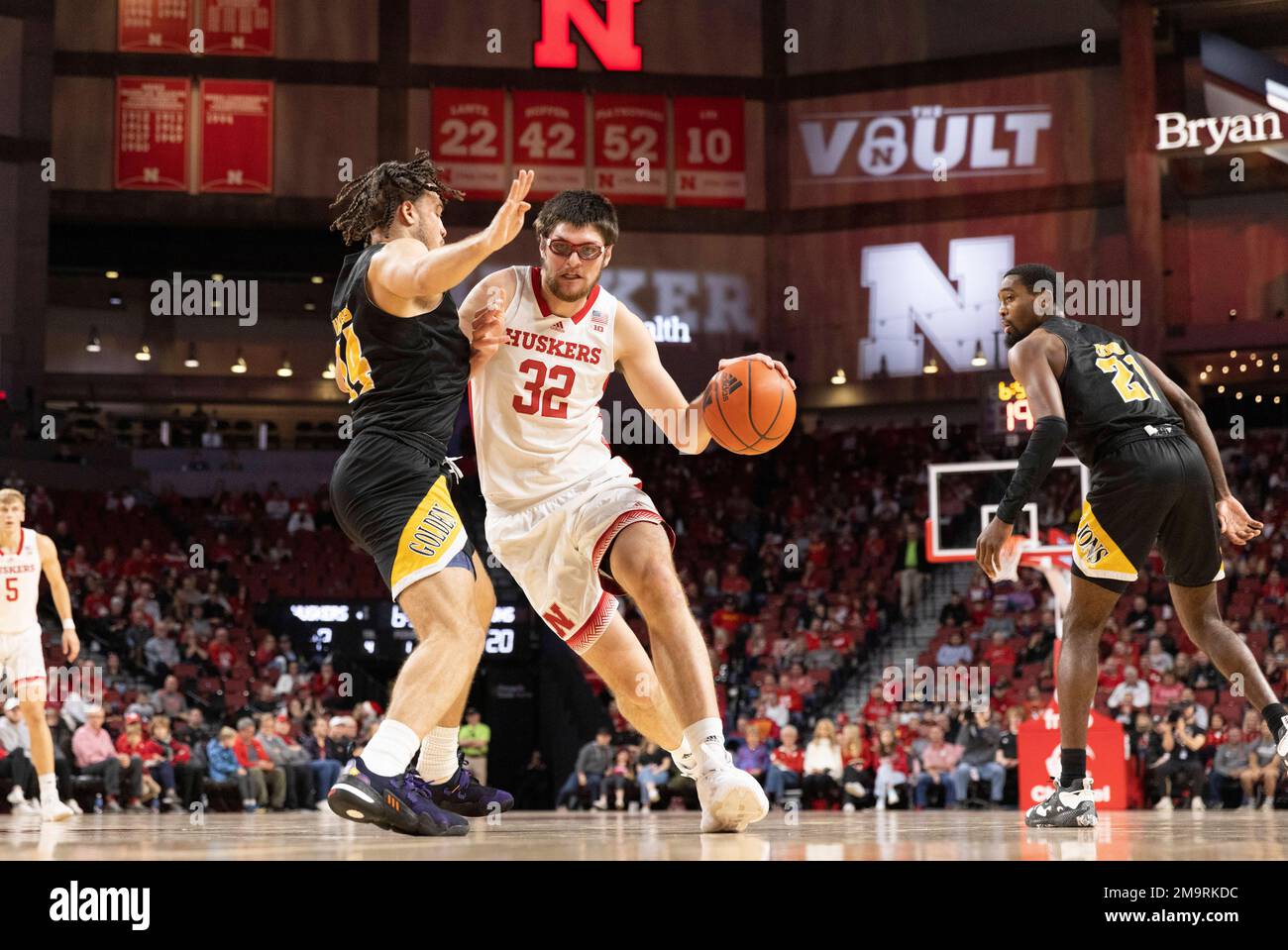 Nebraska's Wilhelm Breidenbach (32) drives between ArkansasPine Bluff