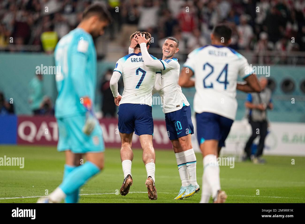 England's Jack Grealish, second left, celebrates with teammate Phil