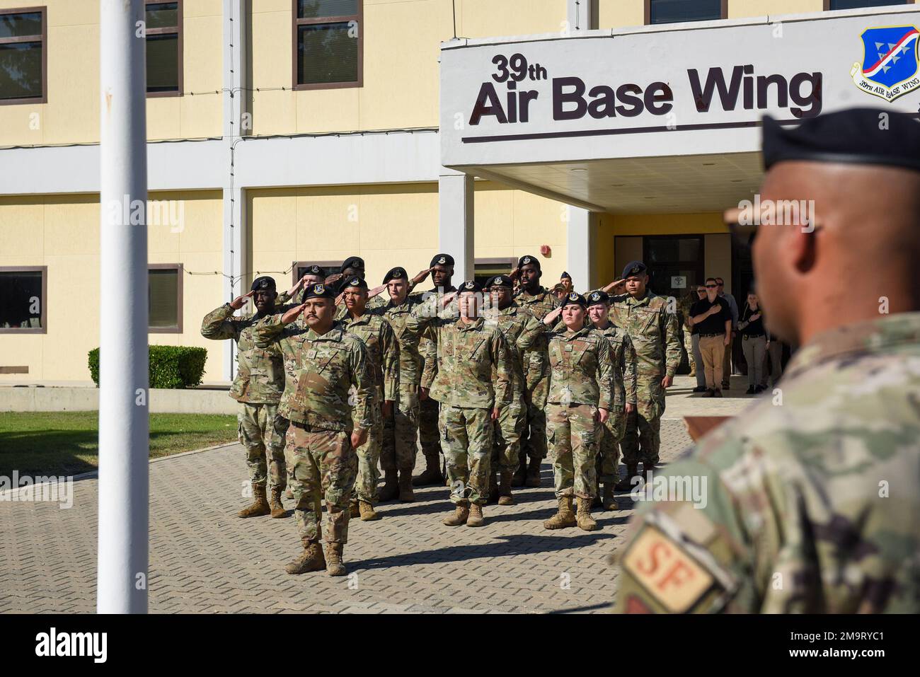 Airmen assigned to the 39th Security Forces Squadron salute the ...