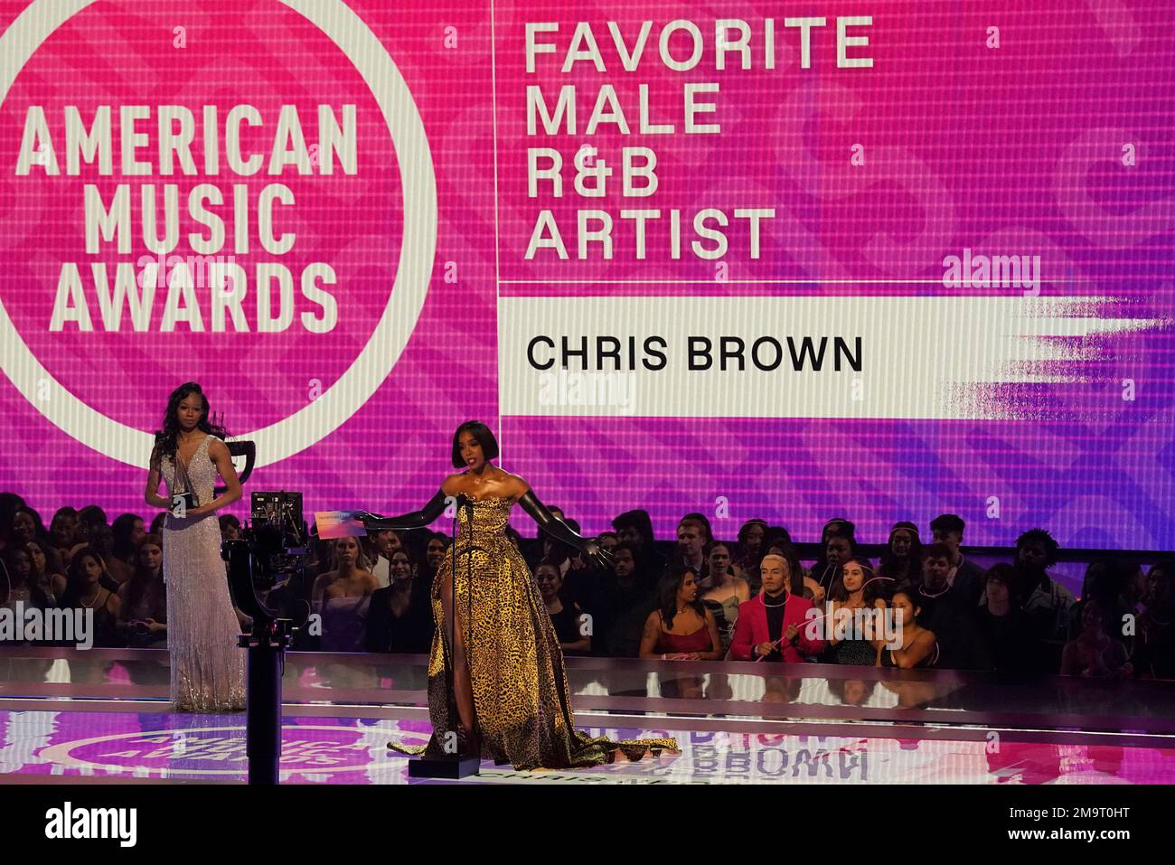 Kelly Rowland accepts on behalf of Chris Brown, the award for favorite ...