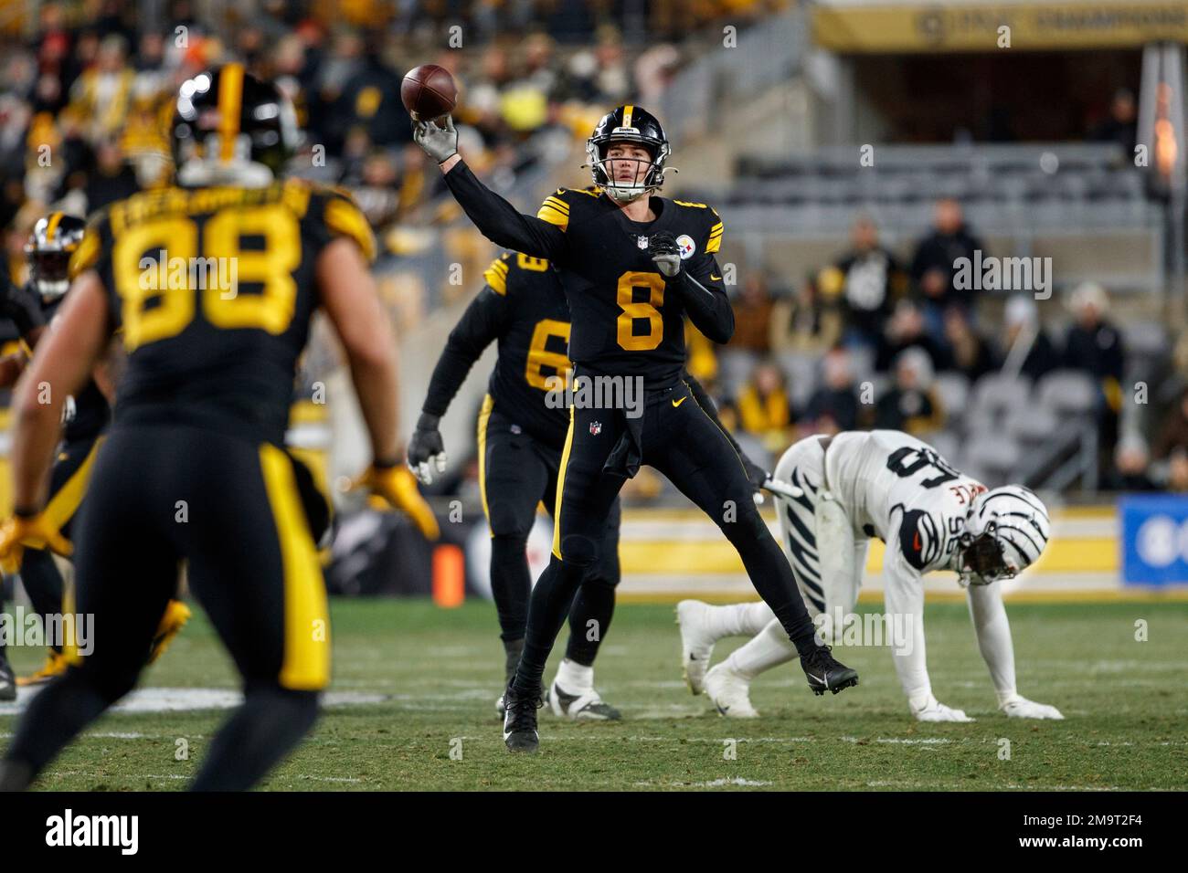 Pittsburgh Steelers quarterback Kenny Pickett (8) throws a pass during an NFL football game