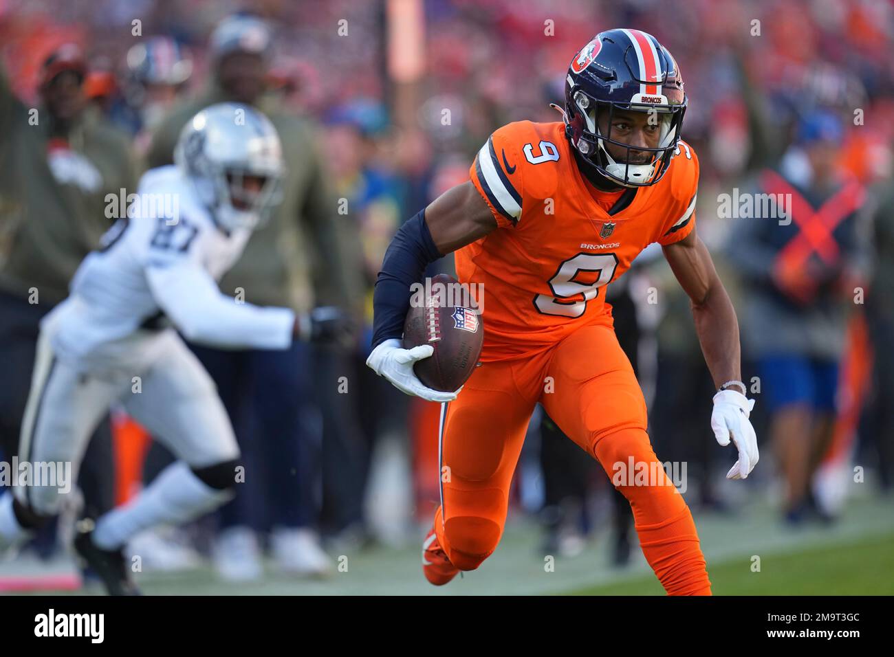 Denver Broncos wide receiver Kendall Hinton (9) runs with the ball during  the first half of an NFL football game against the Las Vegas Raiders,  Sunday, Oct. 2, 2022 in Las Vegas. (