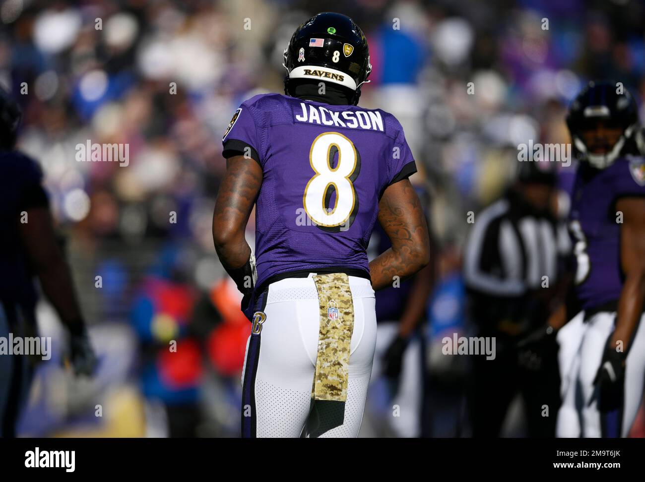 Baltimore Ravens quarterback Lamar Jackson (8) wears his Salute to Serve  towel in the first half of an NFL football game against the Carolina  Panthers Sunday, Nov. 20, 2022, in Baltimore. (AP