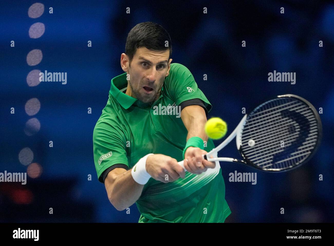 Serbias Novak Djokovic returns with a backhand to Norways Casper Ruud during their singles final tennis match of the ATP World Tour Finals at the Pala Alpitour, in Turin, Italy, Sunday, Nov.