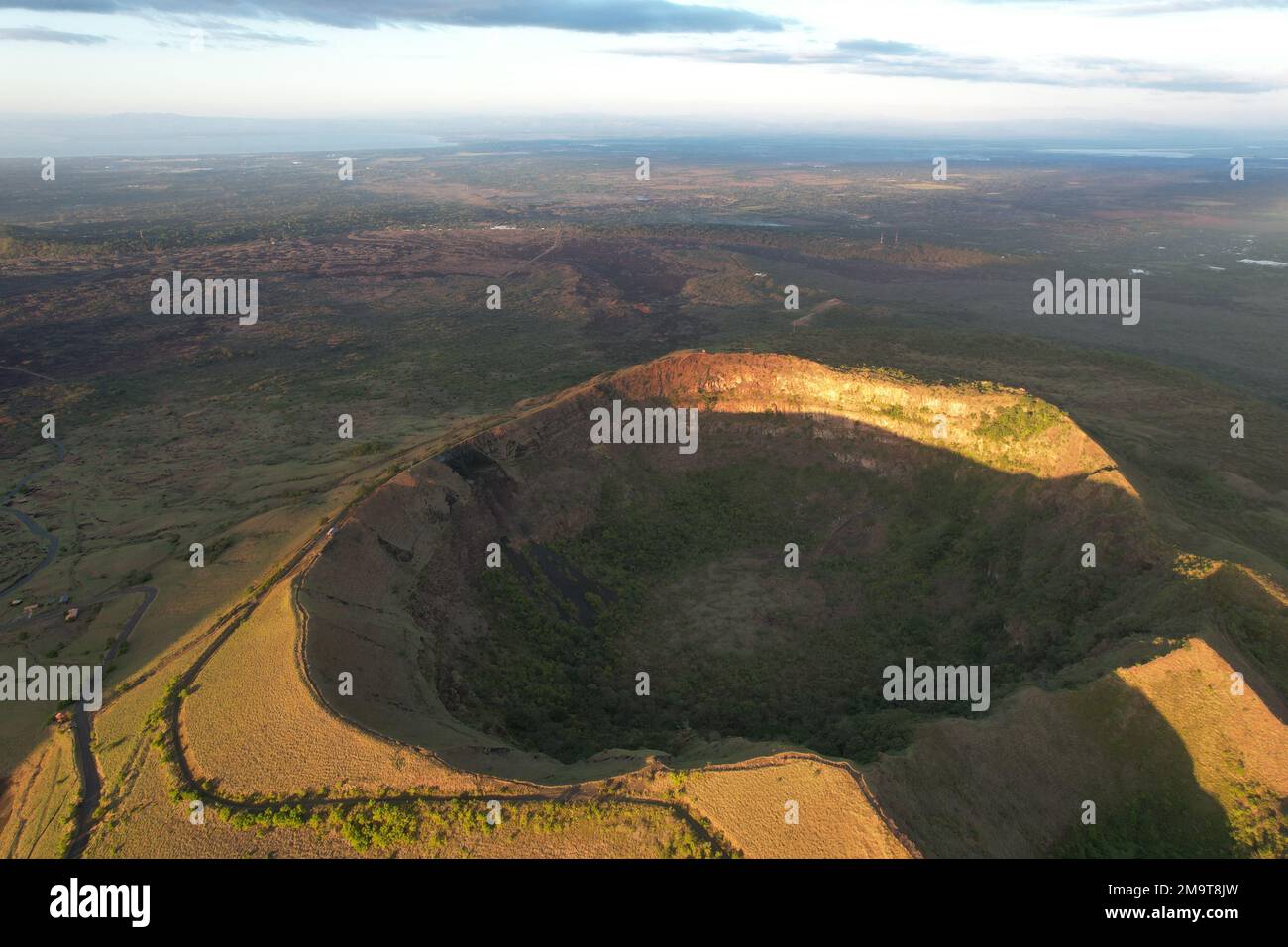 Wide and deep  San Pedro volcano crater above aerial drone view on sunset  time Stock Photo