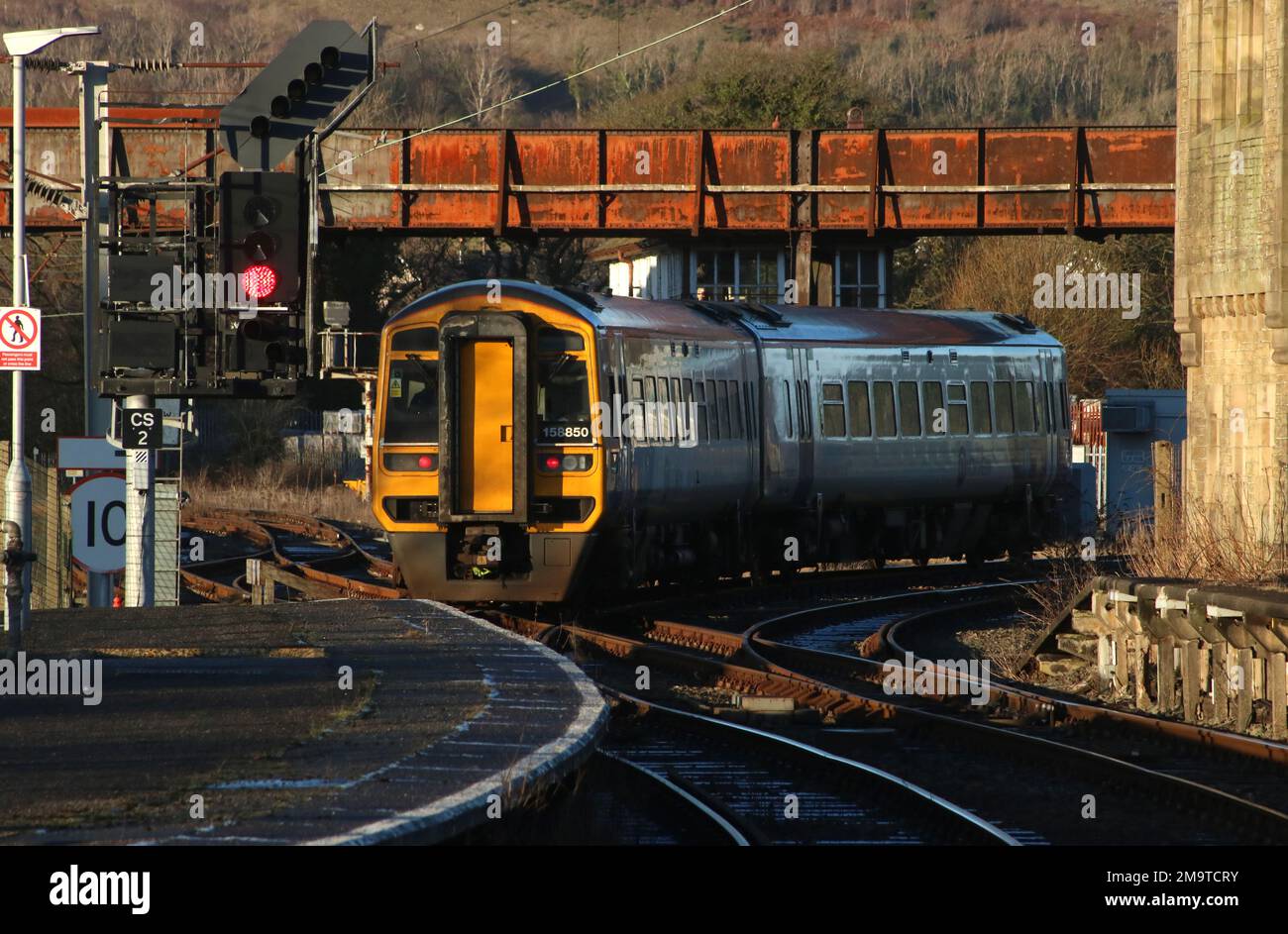 Northern trains class 158 express sprinter dmu 185580 leaving Carnforth station, platform 2 with passenger service to Leeds on 18th January 2023. Stock Photo