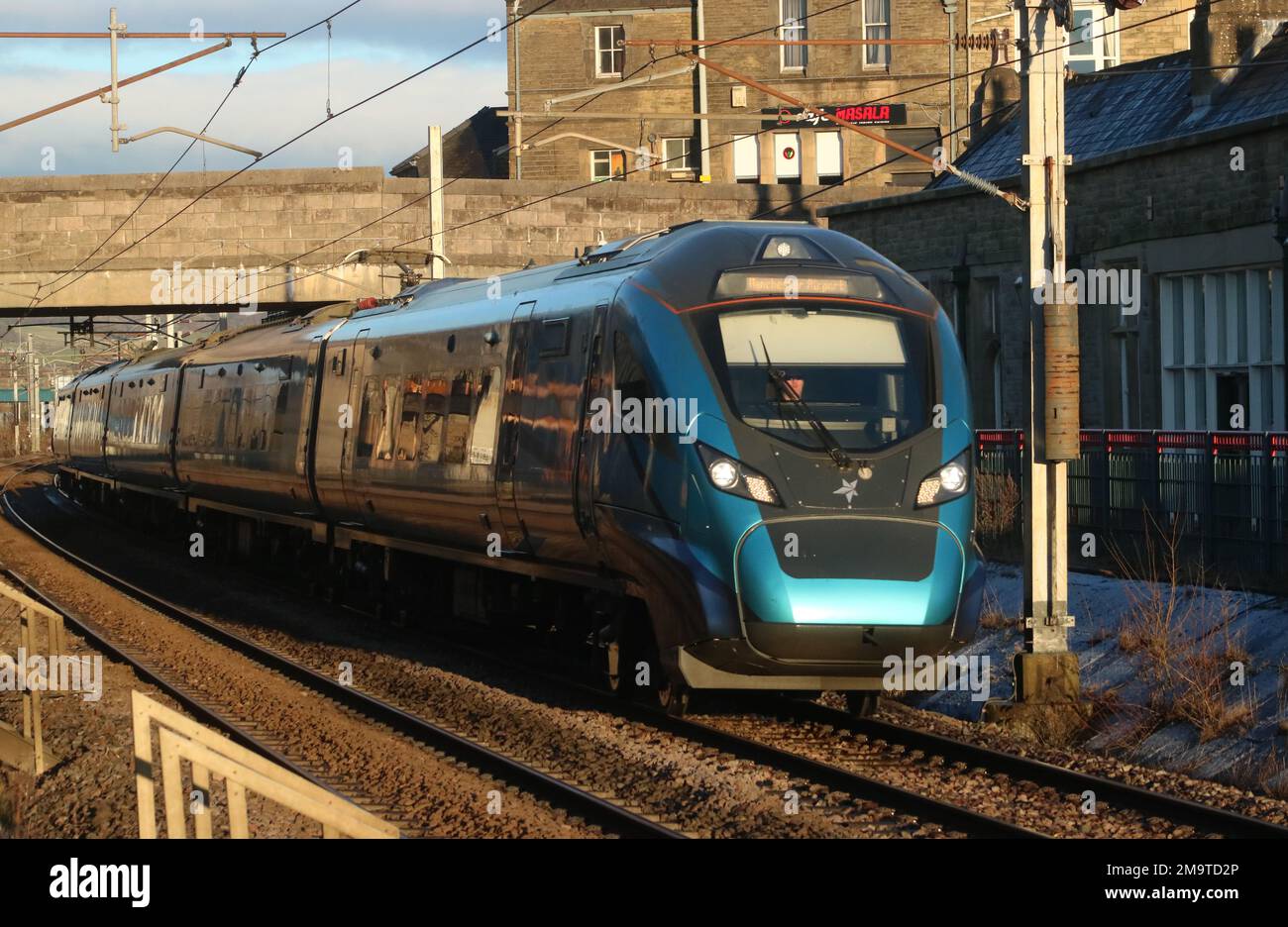 TransPennine Express class 397 civity emu 397005 on West Coast Main Line railway through Carnforth with express passenger working, 18th January 2023. Stock Photo