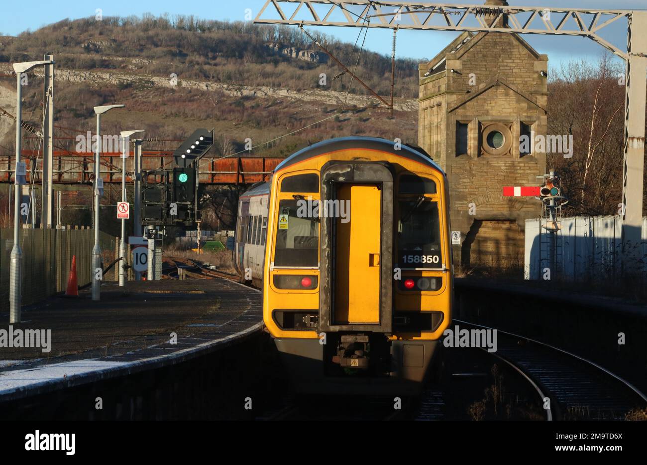 Northern trains class 158 express sprinter dmu 185580 leaving Carnforth station, platform 2 with passenger service to Leeds on 18th January 2023. Stock Photo